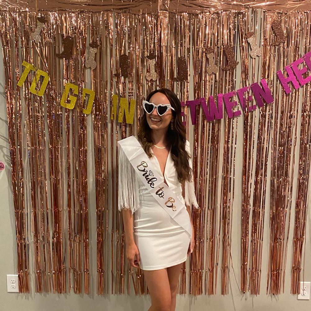 White, fringe sleeve, deep cut dress